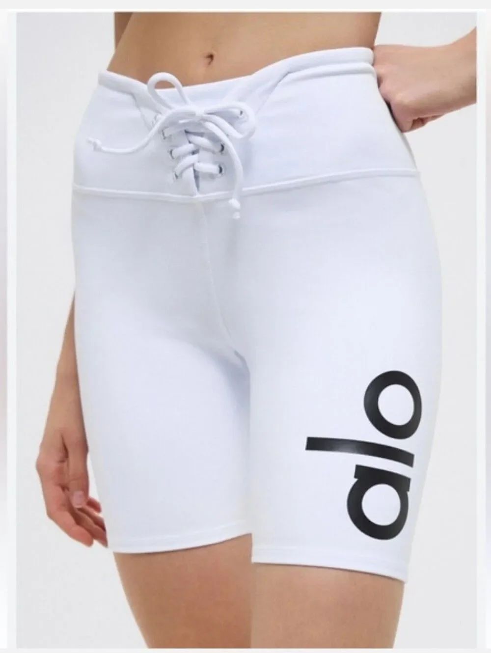 ALO Yoga Lace-Up High-Waist Bike Shorts in White with Black Logo